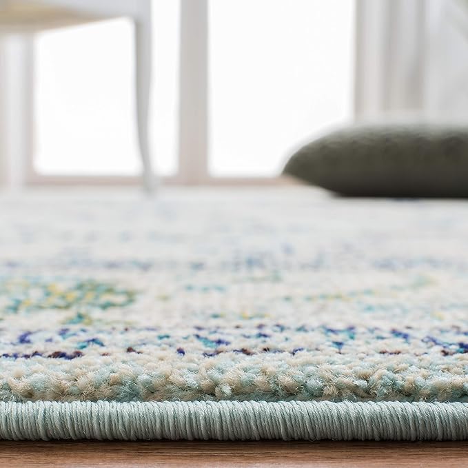 SAFAVIEH Monaco Collection Area Rug - 9' x 12', Light Blue & Ivory, Boho Chic Medallion Distressed Design, Non-Shedding & Easy Care, Ideal for High Traffic Areas in Living Room, Bedroom (MNC243K)