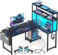 Casaottima Gaming Desk with Power Outlets & LED Lights, 43 Inch Reversible L Shaped Computer Desk with Shelves & Storage Bag, Corner Desk for Home Office, Black