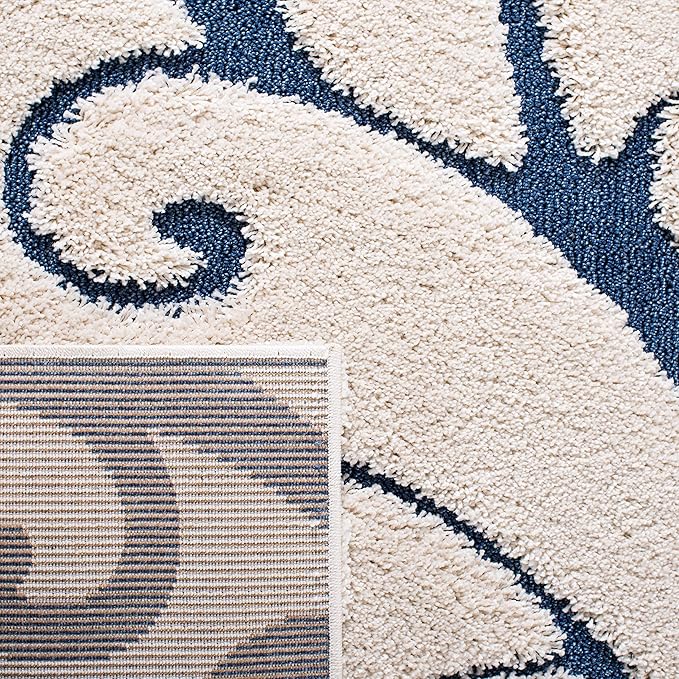SAFAVIEH Florida Shag Collection Area Rug - 9'6" x 13', Cream & Blue, Scroll Design, Non-Shedding & Easy Care, 1.2-inch Thick Ideal for High Traffic Areas in Living Room, Bedroom (SG455-1165)