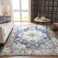 SAFAVIEH Monaco Collection Area Rug - 10' x 14', Navy & Light Blue, Boho Chic Medallion Distressed Design, Non-Shedding & Easy Care, Ideal for High Traffic Areas in Living Room, Bedroom (MNC243N)