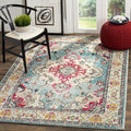 SAFAVIEH Monaco Collection Area Rug - 6'7" x 9'2", Light Blue & Fuchsia, Boho Chic Medallion Distressed Design, Non-Shedding & Easy Care, Ideal for High Traffic Areas in Living Room, Bedroom (MNC243J)