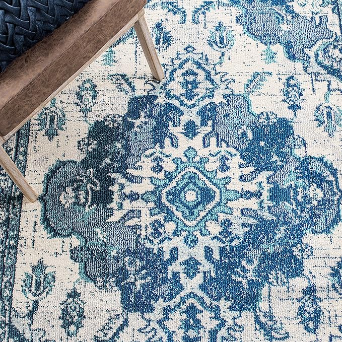 SAFAVIEH Monaco Collection Area Rug - 6'7" x 9'2", Ivory & Blue, Boho Chic Medallion Distressed Design, Non-Shedding & Easy Care, Ideal for High Traffic Areas in Living Room, Bedroom (MNC243A)